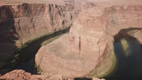 Aerial-drone-shot-of-horseshoe-bend-with-Colorado-River-in-Page,-Arizona,-United-States-of-America,-also-referred-to-as-the-"east-rim-of-the-Grand-Canyon
