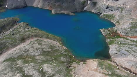 Aerial-View-of-Blue-Glacial-Water,-Columbine-Lake,-San-Juan-National-Forest,-Colorado-USA