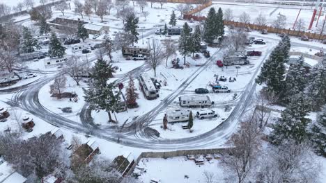 Aerial-view-of-snow-falling-on-an-RV-Park