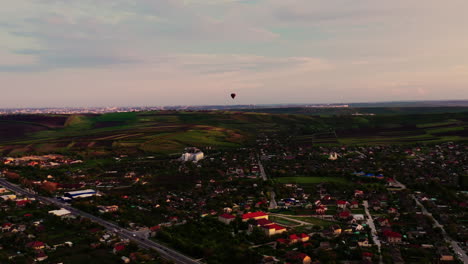 Republic-of-Moldova,-Magdacesti-village,-hot-air-balloon-in-the-evening