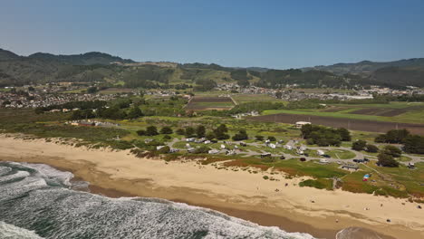 Half-Moon-Bay-California-Aerial-v1-fly-around-venice-beach-capturing-rural-seaside-state-park-and-campground-with-mountain-landscape-and-pacific-ocean-view---Shot-with-Mavic-3-Cine---May-2022