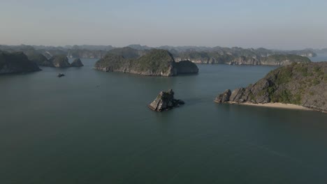 Aerial:-Steep-rock-islands-dot-famous-tourist-destination,-Ha-Long-Bay