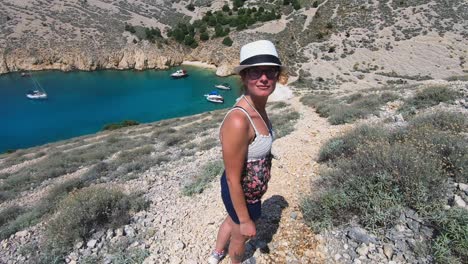 Female-traveler-posing-at-picturesque-Krk-Island-Croatia