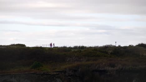 Tracking-Shot-Tourists-Silhouette-Walking-From-the-Viewpoint