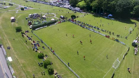 Closeup-Orbit-Aerial-Shot-of-Football-Soccer-Game-Salthill,-Galway-City,-Ireland