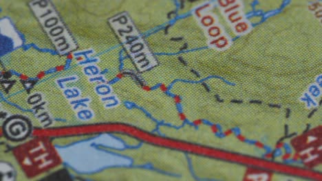 Closeup-Of-Algonquin-Park-Map,-Lakes-And-Walking-Trails
