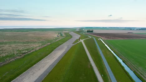 Flying-over-dutch-dike-landscape-holland-water-technology-for-keeping-the-Netherlands-save-from-floods-4k