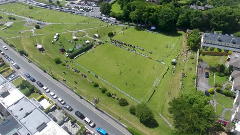 Orbit-Aerial-Shot-of-Soccer-Football-Game-Salthill,-Galway-City,-Ireland