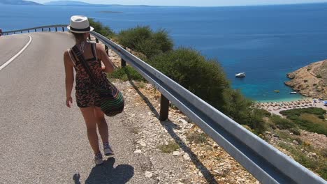 Women-walk-her-way-to-stunning-beach-in-the-island-of-Krk-,-Croatia