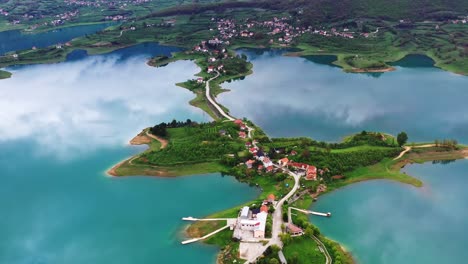 Ripci-Township,-Rowing-Club-and-Franciscan-Monastery-In-Lake-Ramsko
