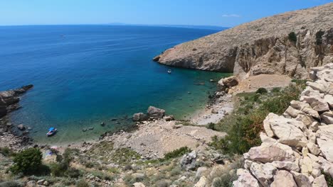 woman-enjoy-beautiful-bay-sea-view-from-a-cliff,-Krk-Island,-Croatia