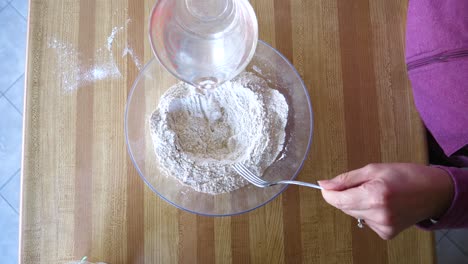 Stirring-Scone-Ingredients---Flour-Water-Baking-Powder---60fps