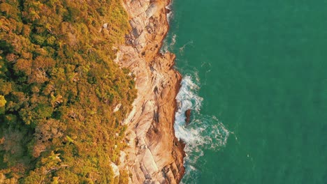 Tropical-rocky-coastline-aerial-top-down-view