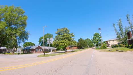 POV-Driving-through-small-rural-town-in-Illinois