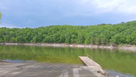 POV-driving-away-from-a-boat-launch-on-Bear-Creek-Reservoir,-Alabama