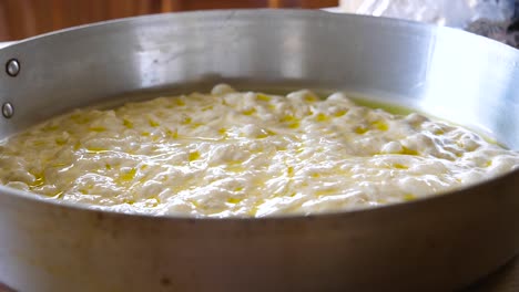 Focaccia-Dough-in-Metal-Pan-Before-Baking-Close-Up---Cooking