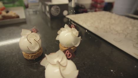 Dusting-pastries-with-icing-sugar.-Slow-motion