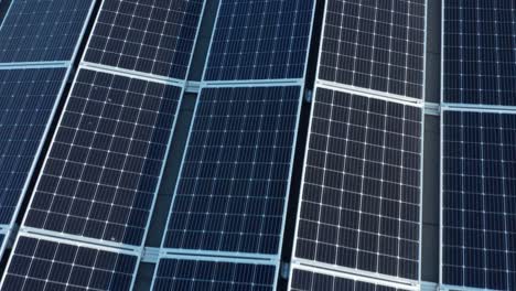 Photovoltaic-Solar-Panel-Array,-Drone-Aerial-Close-Up-View,-Alternative-Renewable-Energy-Concept