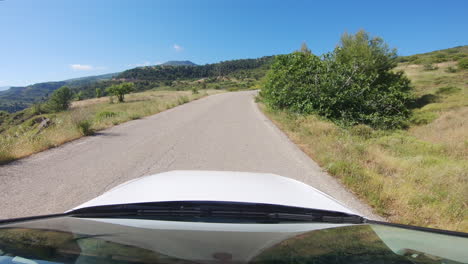 POV-driver:-traveling-and-driving-around-curve-towards-straight-mountain-road-in-Peloponnese,-Achaia,-Greece