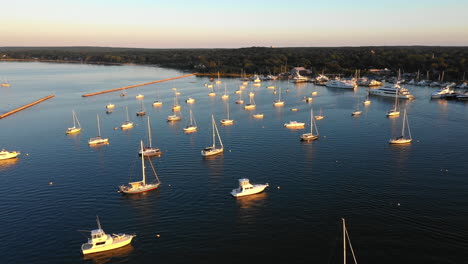 Aerial-Flyover-Of-Sailing-And-Fishing-Boats-In-The-Hamptons-At-Sunset