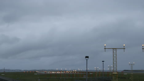 Plane-taking-off-at-Sydney-Airport-Australia-in-gray-stormy-weather-shot-in-4k-high-resolution