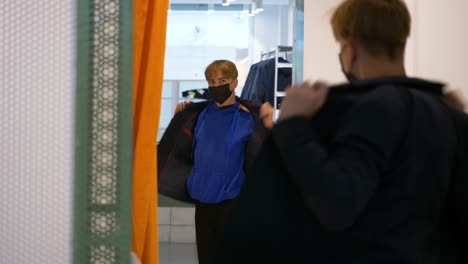 Schoolboy-tries-uniform-jacket-with-face-mask
