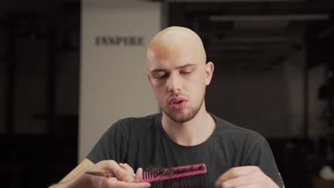 Men's-haircut-in-a-barbershop-bald-barber