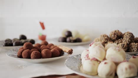 Detail-shot-of-traditional-homemade-chocolate-cappuccino-coco-vanilla-sweet-pastry-cakes-medium-shot