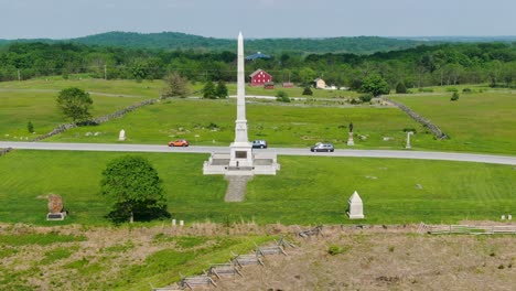 Gettysburg-National-Military-Park-monuments,-aerial-drone-push-in-of-famous-American-Civil-War-battlefield