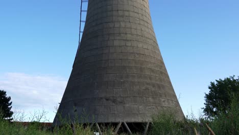 Concrete-tower-of-abandoned-coal-fired-plant-station-after-air-pollution-on-environment