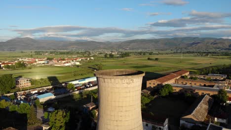 Industrial-site-of-a-complex-with-coal-fired-plant-station,-tall-chimney-tower-in-Albania