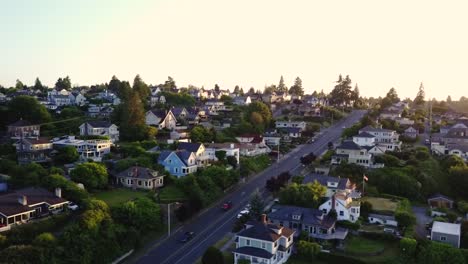 Flying-over-a-quiet-neighborhood-in-Tacoma,-Washington-during-sunset---aerial