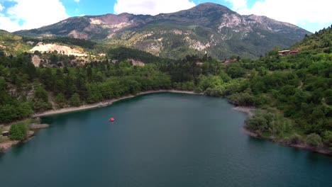 Aerial-shot-flying-above-lake-Tsivlou-in-Peloponnese-mountains-of-Greece