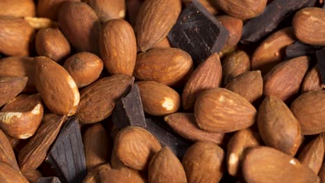 Closeup-Of-Almond-Nuts-With-Dark-Chocolate,-Healthy-Food