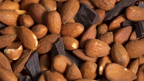Closeup-Of-Almond-Nuts-And-Dark-Chocolate,-Healthy-Food