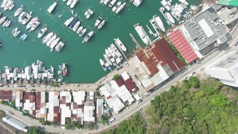 Hong-Kong-marina-and-Typhoon-shelter-small-boats-on-a-clear-Summer-day,-Aerial-view