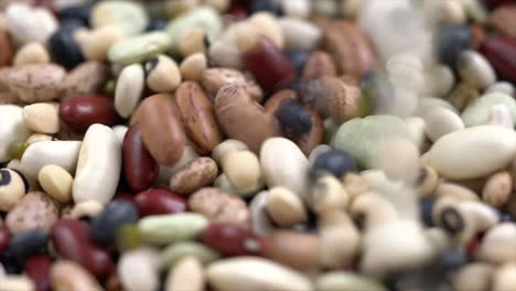 Close-up-a-pile-of-mixed-beans-and-there-were-some-beans-falling-in-the-pile-at-the-same-time