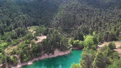Aerial-slow-dolly-in-movement-above-Lake-Tsivlou