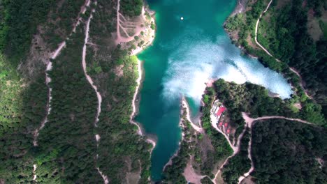 Aerial-bird-eye-view-flying-above-lake-Tsivlou-in-the-mountains-of-Peloponnese-in-Greece