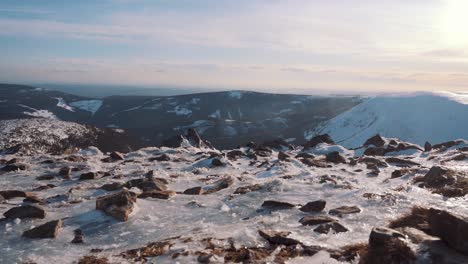 View-of-snowy-mountains-from-frozen-mountain-top