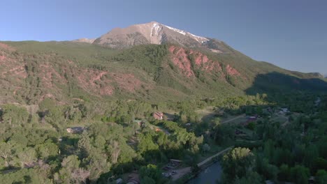 Aerial-view-moves-up-to-reveal-Mount-Sopris-in-Carbondale-Colorado