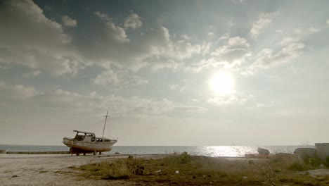 shipwreck-beached-on-sand-near-sea-sunny-day-,-old-ship-ruins-abandoned-vintage-boat-old-memories-moody-cinematic-shot