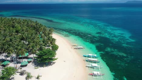 Aerial-View-of-Majestic-White-Sand-Beach,-Tropical-Sea-and-Lush-Vegetation-on-Corregidor-Island,-Luzon,-Philippines