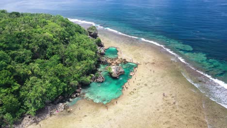 Exotic-Natural-Tidal-Pools,-Drone-Aerial-View-of-Scenic-Magpupungko-Rock-Pools,-Siargao-Island,-Philippines