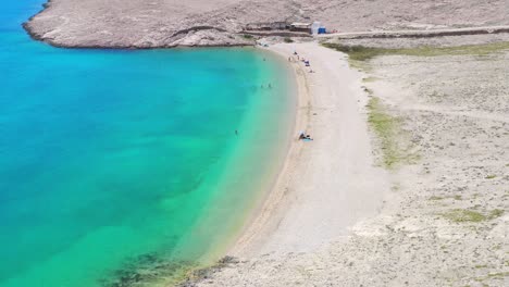 Paradisiac-white-sand-beach-with-turquoise-pristine-water,-Pag-Island