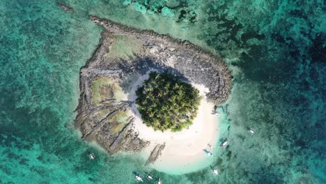 Birds-Eye-Aerial-View-of-Small-Uninhabited-Guyam-Island-in-Siargao-Archipelago,-Philippines