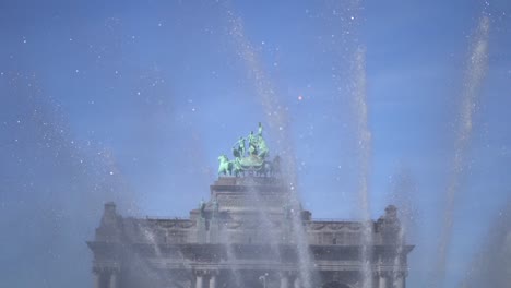 Spraying-fountain-with-the-quadriga-of-the-Triumph-Arch-in-the-background