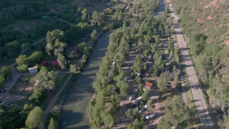 Aerial-view-pans-up-from-the-river-to-reveal-Mount-Sopris-in-Carbondale-Colorado