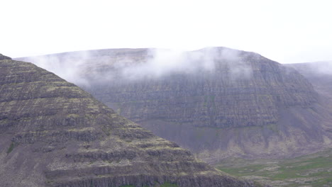 Dramatic-foggy-mountain-landscape.-Pan-right-shot