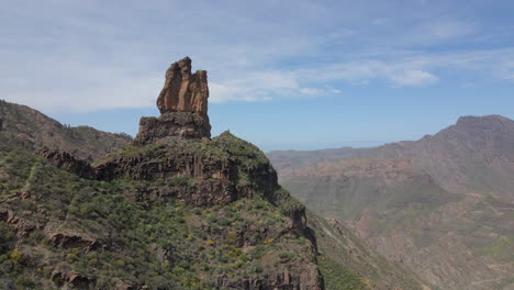 Aerial-shot-in-approach-to-Roque-Mulato-on-the-island-of-Gran-Canaria-on-a-sunny-day